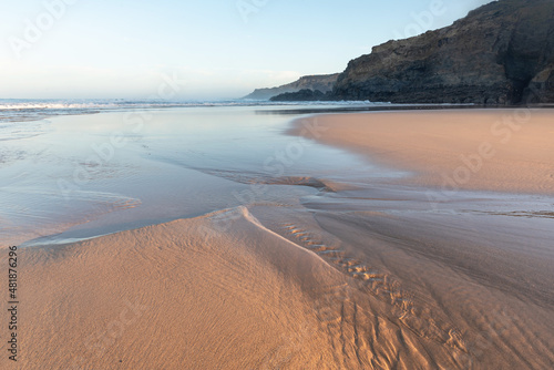 Cliffs and low tide in Carvalhal Beach. Grândola