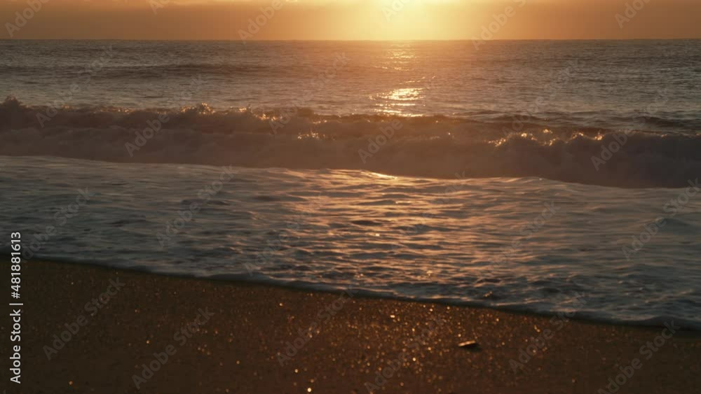 waves crash on the beach early in the morning waves crash on the beach early in the morning