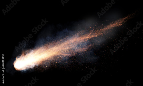 texture of a falling comet with sparks, smoke and a trail of particles, isolated on a black background photo