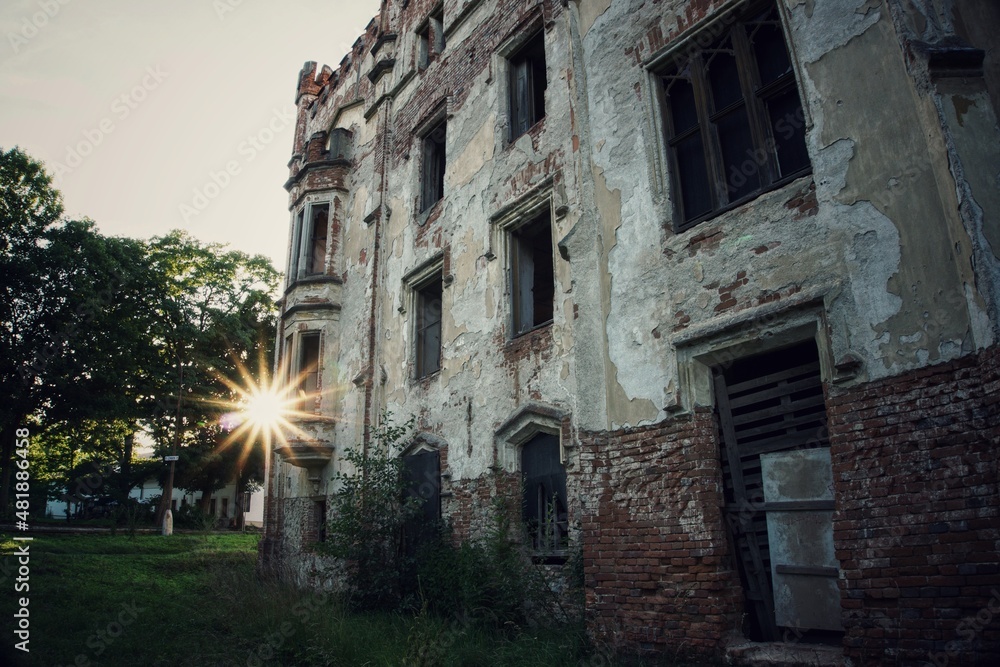 Urban exploration. Old building in the countryside. Rays of the sun, former castle. Czech Republic.