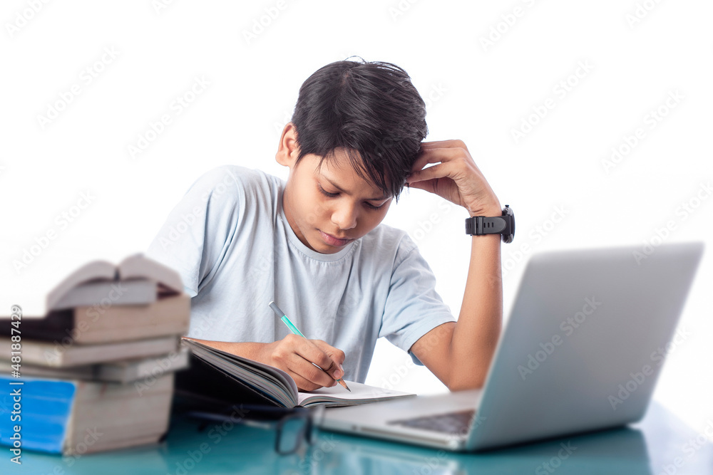 student taking online class with books and laptop on a desk in isolated white background student taking online class with books and laptop on a desk in isolated white background