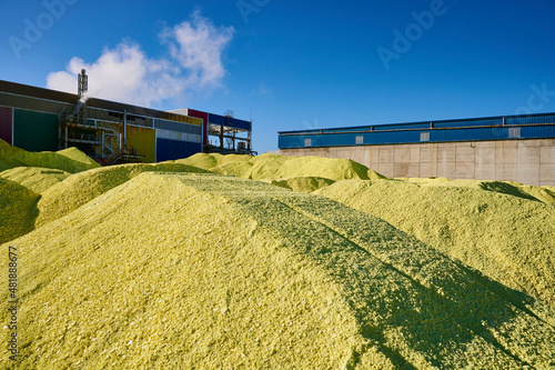 A Yellow Pile of Sulfur Produced in an Industrial Facility photo