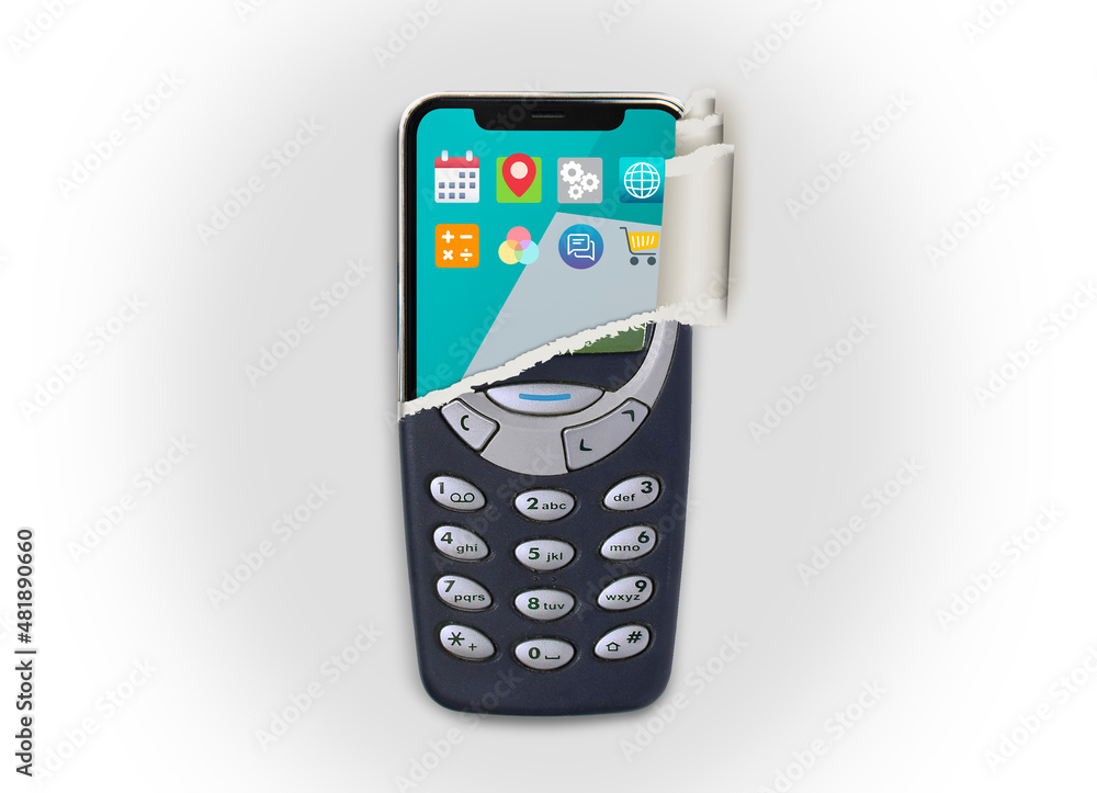 Old mobile cell phone is ripped to show new smartphone Old mobile cell phone is ripped to show new smartphone