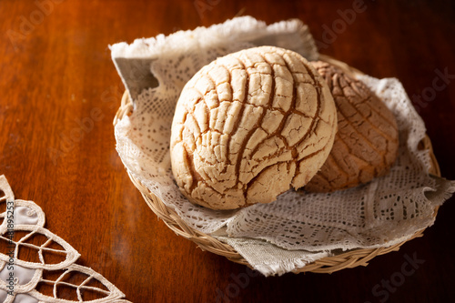 Conchas. Mexican sweet bread roll with seashell-like appearance, Usually eaten with coffee or hot chocolate at breakfast or as an afternoon snack. photo