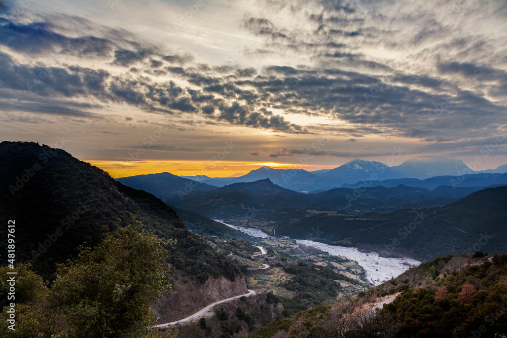 Sunset over the valley of Aperantia, in the mountainous region of Evritania, in Central Greece, Europe. 