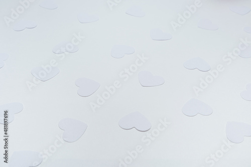 white hearts on a white background