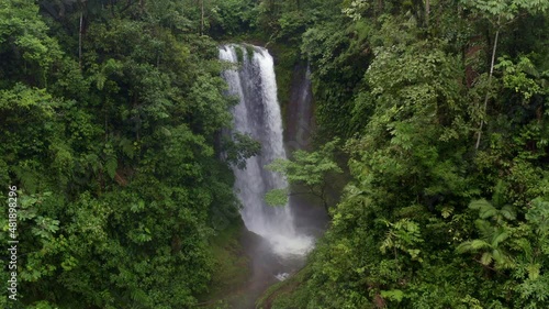 Still video of a stunning waterfall inside a tropical forest of South America, a nature background