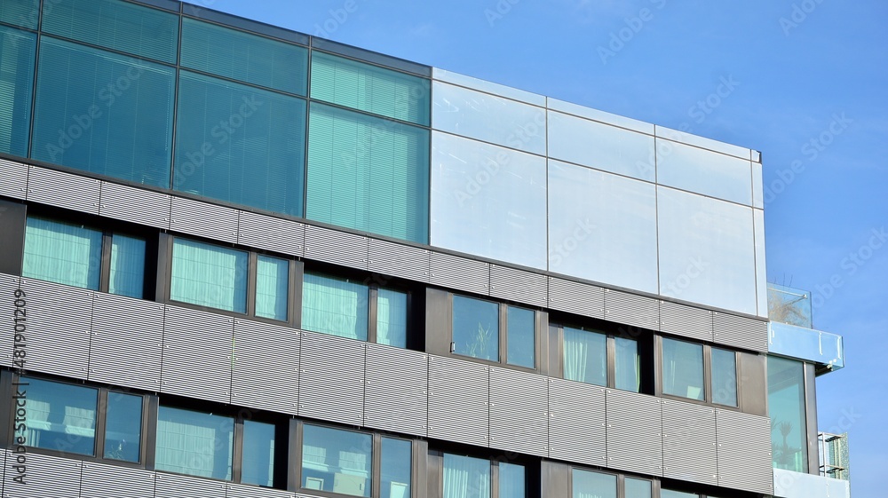 Facade of a modern apartment condominium in a sunny day Facade of a modern apartment condominium in a sunny day