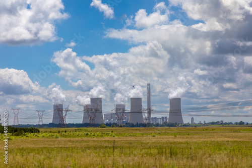 Coal power station near Vereeniging in South Africa. Electrical pylons in the foreground. 