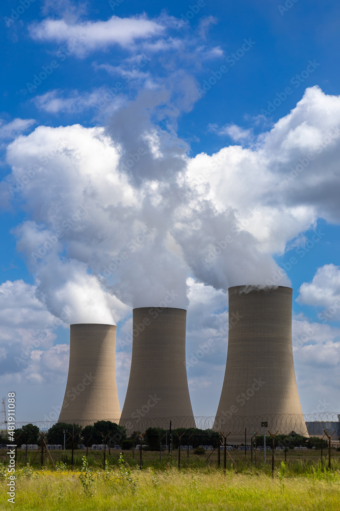 Cooling towers of a coal power plant releasing water vapour into the atmosphere 