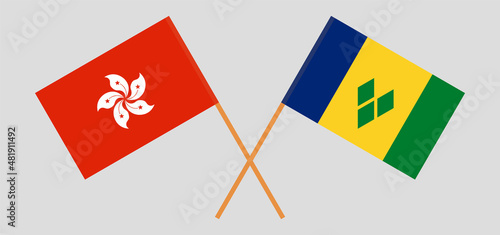 Crossed flags of Saint Vincent and the Grenadines and Hong Kong. Official colors. Correct proportion