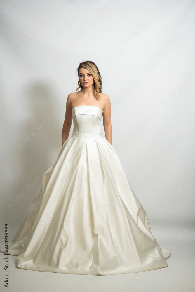 Beauty young blonde bride white wedding dress