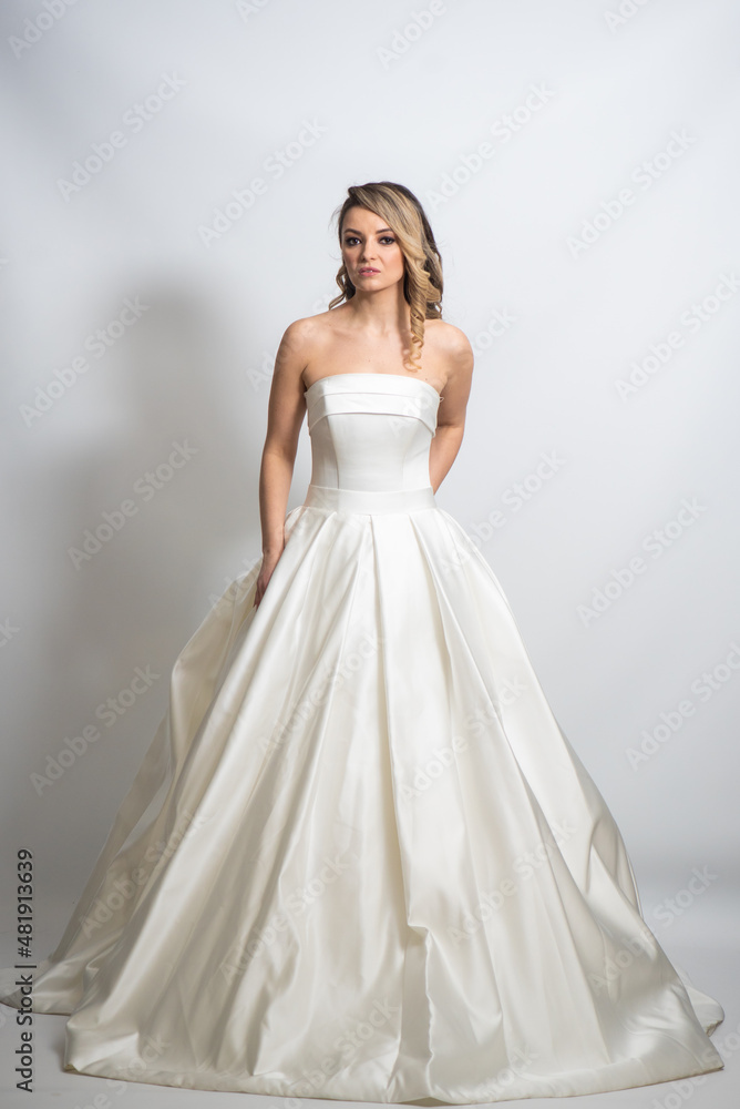 Beauty young blonde bride white wedding dress