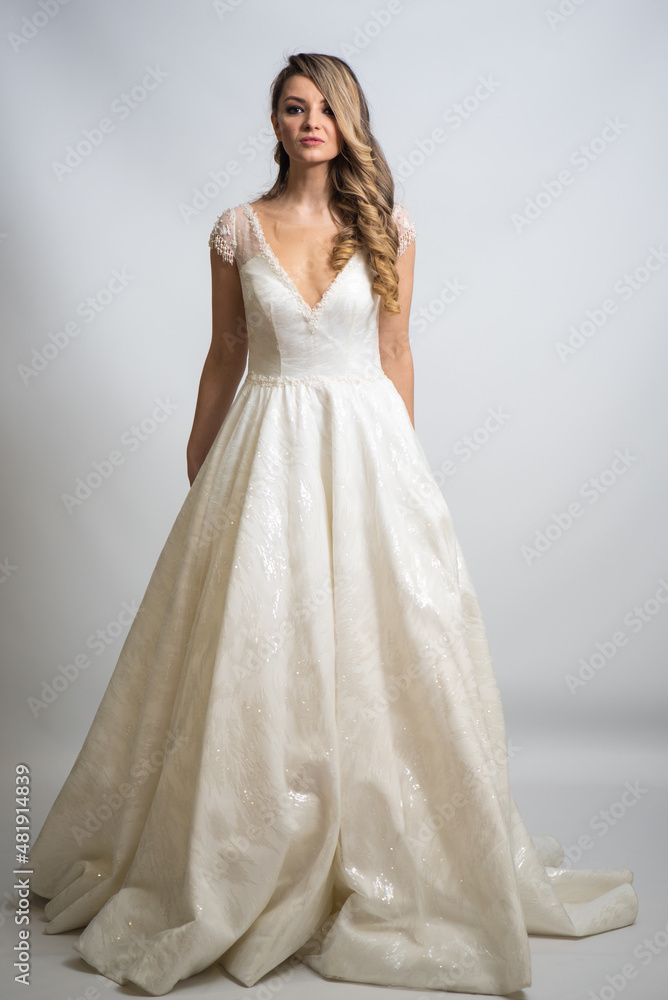 Portrait of happy beautiful bride on white background