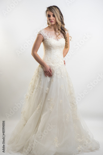 Portrait of happy beautiful bride on white background