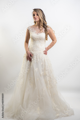 Portrait of happy beautiful bride on white background