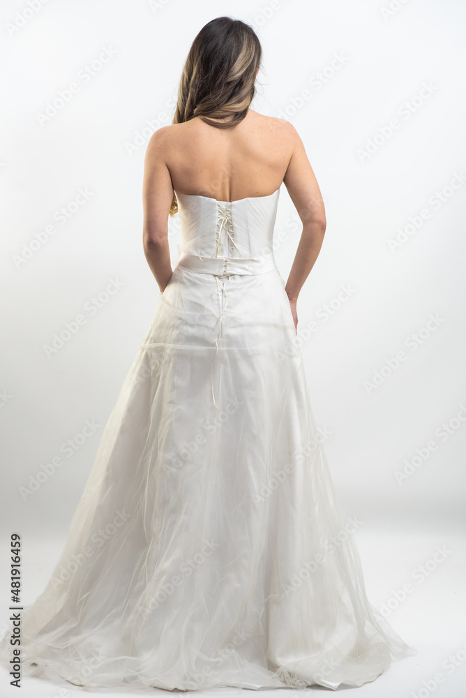 beautiful young blond woman in dress on white studio background beautiful young blond woman in dress on white studio background