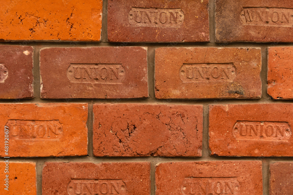 Laying of old orange bricks. Wall, background, texture Laying of old orange bricks. Wall, background, texture