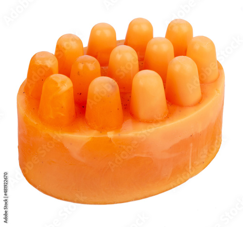 Massage scrub soap bar with citrus on white background