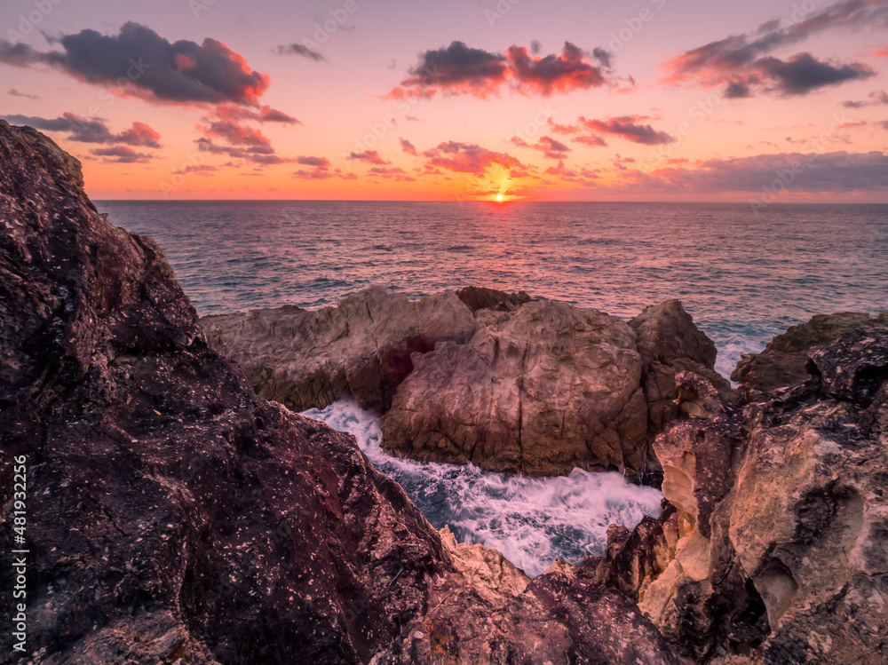Coastal Sunrise Over Dramatic Rocks