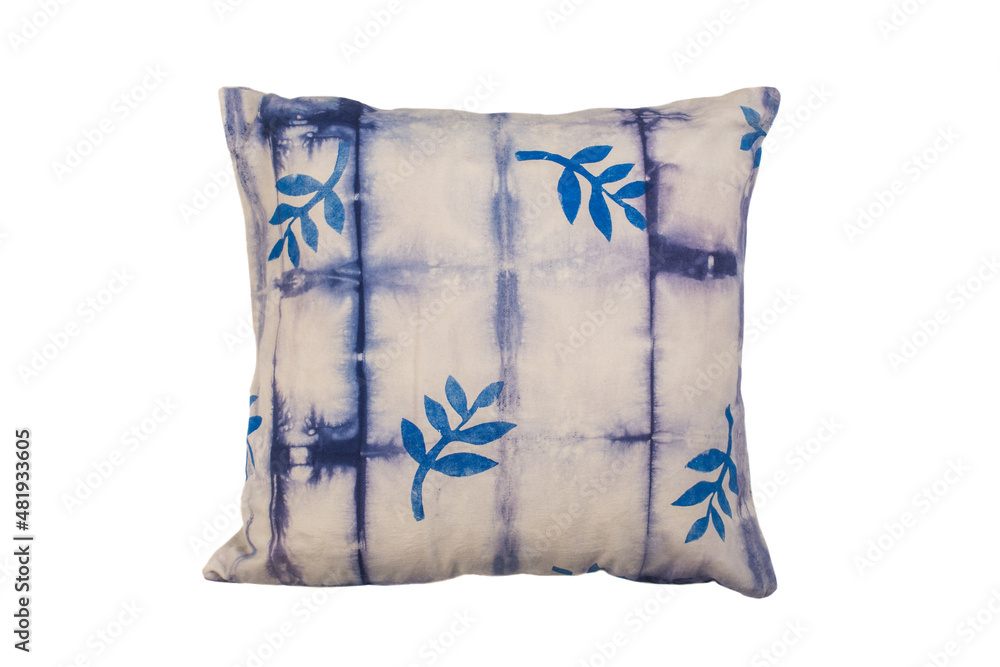 Decorative soft pillow,. beige with blue tropical print pattern isolated on white background