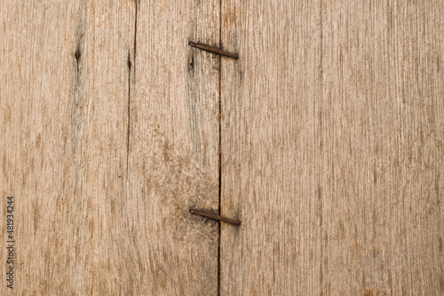 raw and old wood texture with iron nails