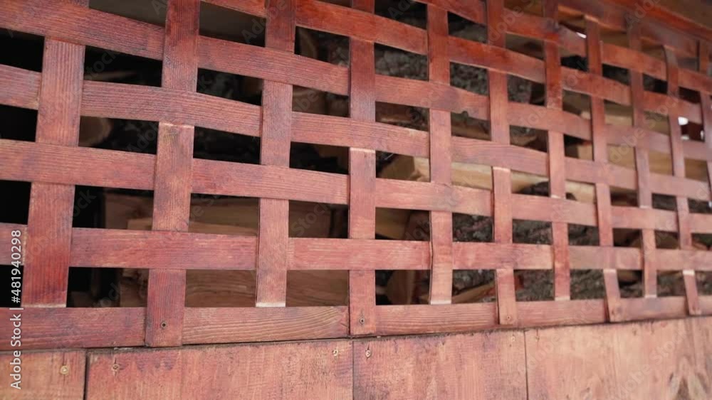 The mesh is made from thin wooden sheets of wood to ventilate firewood