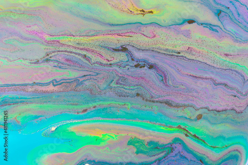 Streams of liquid purple and green inks background. Waves of fluid vivid fluid paint.