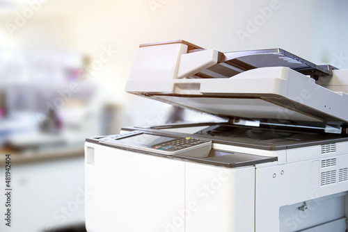 Copier printer, Close up the photocopier or photocopy machine office equipment workplace for scanner or scanning document and printing or copy paper duplicate and Xerox. photo