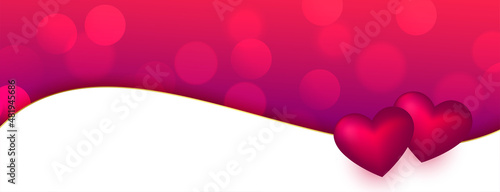 stylish hearts wavy banner on bokeh background