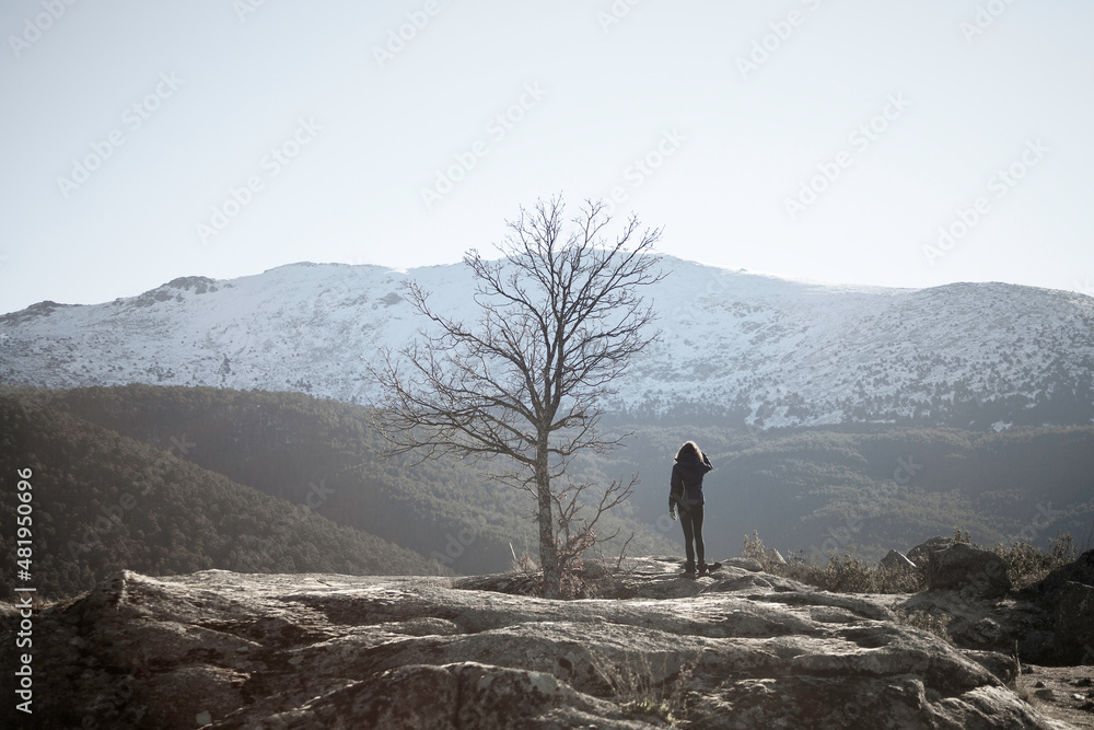 young woman practicing hiking in the Sierra de Guadarrama National Park,