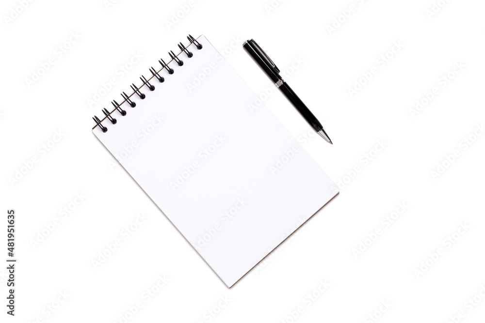 Top view, empty notebook and pen on a white background.with clipping path Top view, empty notebook and pen on a white background.with clipping path