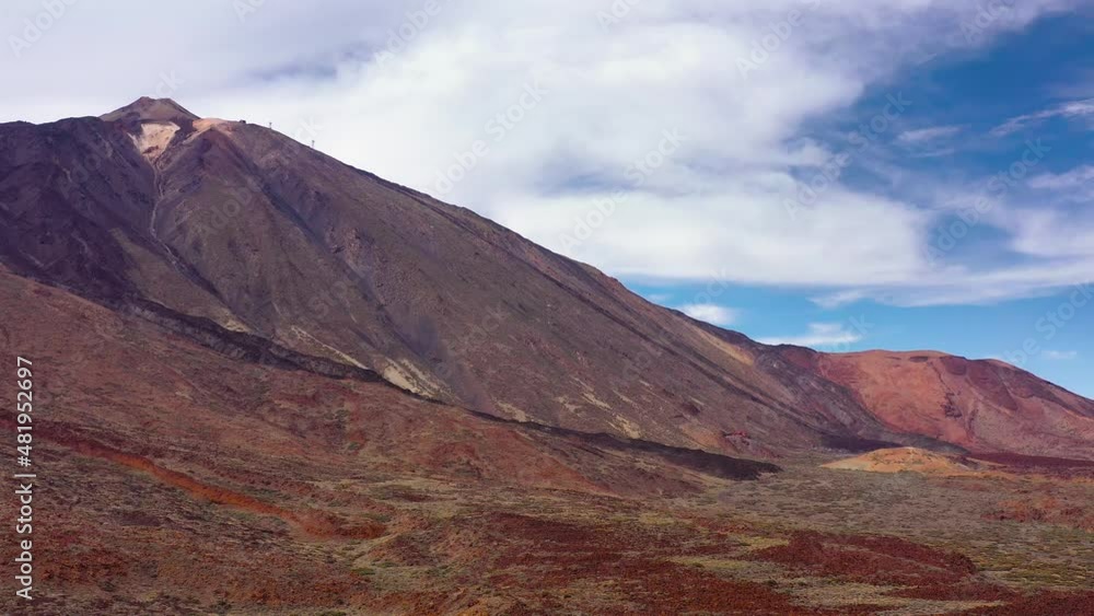 Aerial view of the Teide National Park, flight over a desert rocky surface, view on the Teide volcano. Tenerife, Canary Islands Aerial view of the Teide National Park, flight over a desert rocky surface, view on the Teide volcano. Tenerife, Canary Islands