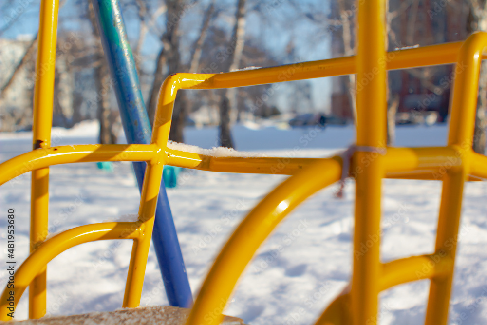 Swing on winter background.