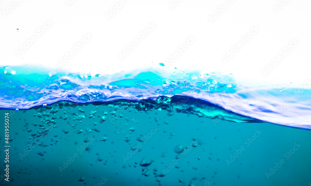 Water and air bubbles over white background,Blue sea waves. Water and air bubbles over white background,Blue sea waves.