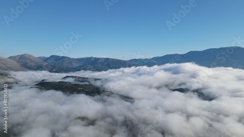 defauAerial View Massive Clouds Of Fog Above The valley Of Koritiani Village In thesprotia  Epirus  Greecelt