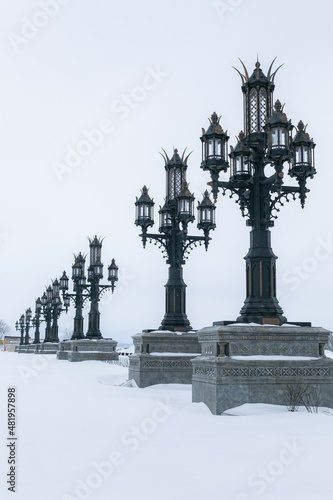 Beautiful stunning row of lampposts in winter