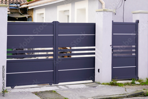 door modern steel aluminum grey gate portal of suburb house