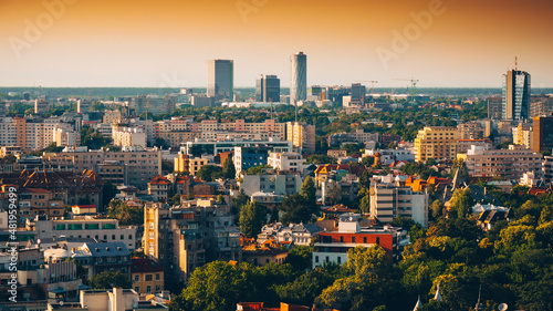 Bucharest view from above during summer sunrise. Landmarks of the capital city of Romania.