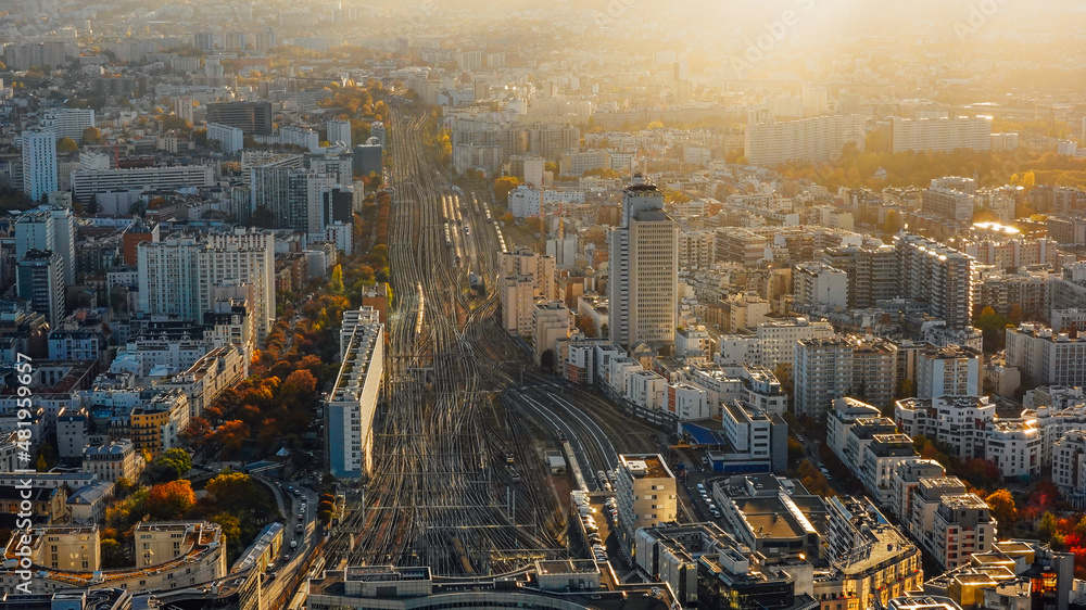 Fototapeta premium Paris view from above during a spectacular autumn sunset evening from Montparnasse Tower to Tour Eiffel - amazing color skyline