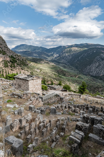 Ruins of an ancient city above a mountain valley