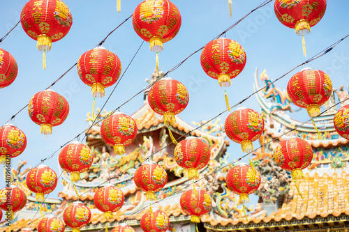 Red Chinese lantern hanging in shrine