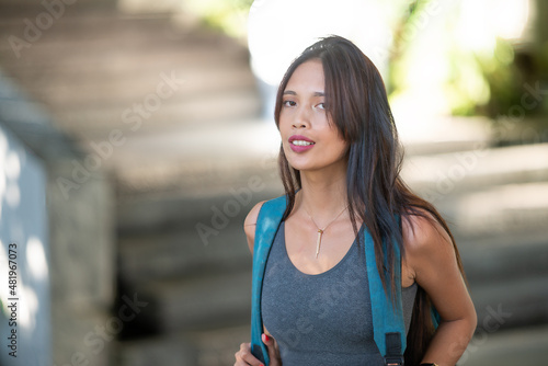 Fototapeta Naklejka Na Ścianę i Meble -  Beautiful asian woman going to the city park for daily training.