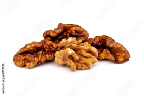 Walnut kernels isolated on white background. Space for text.