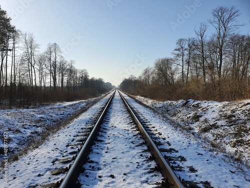 Railway track in winter with snow