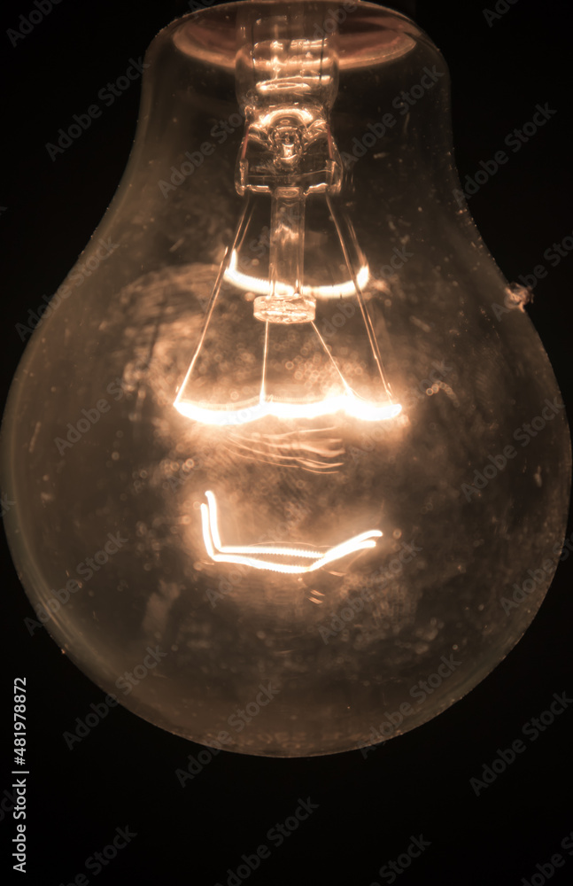 A Filament bulb lighting at night A Filament bulb lighting at night