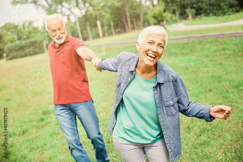 senior couple happy elderly love together retirement lifestyle smiling man woman mature fun © Lumos sp