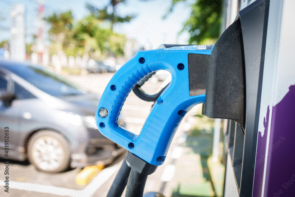 Electric car battery charging at charge station Electric car battery charging at charge station