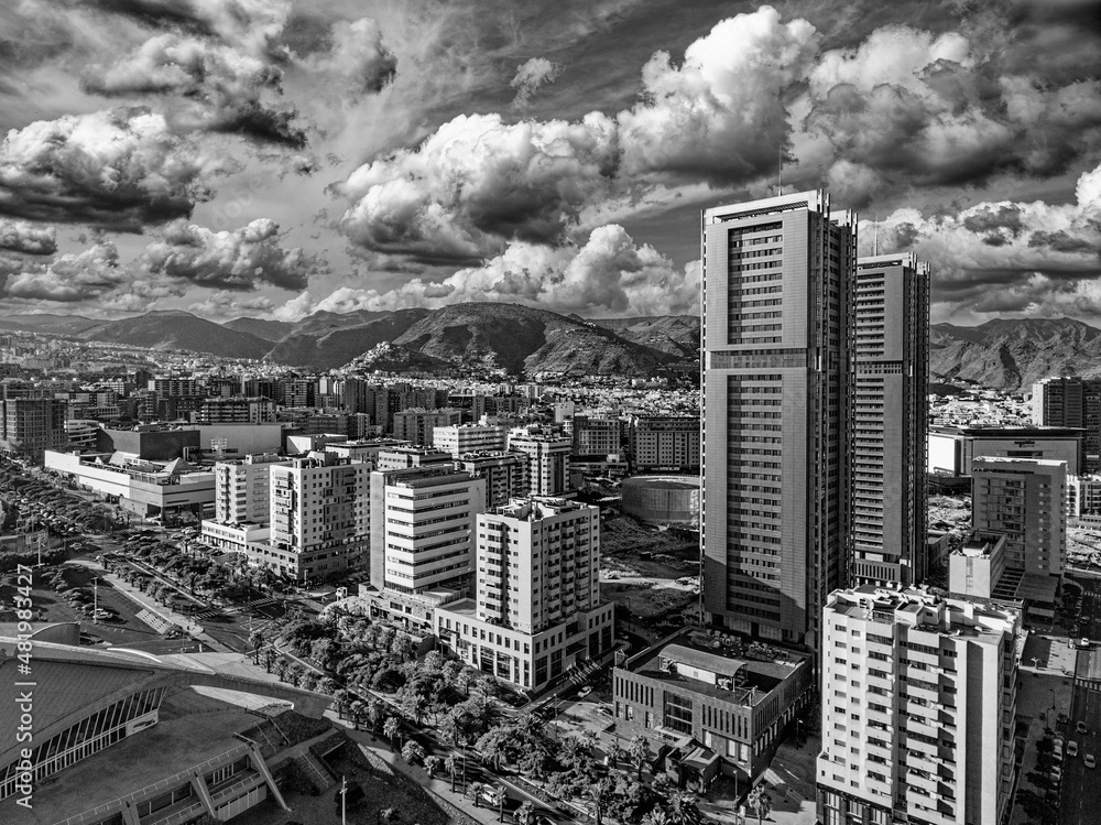 Aerial view of Santa Cruz de Tenerife on a sunny day. Skyscrapers and coastline from drone, Canary Islands..