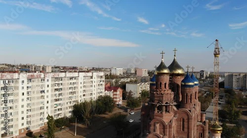 construction of a church and apartment buildings in Russia